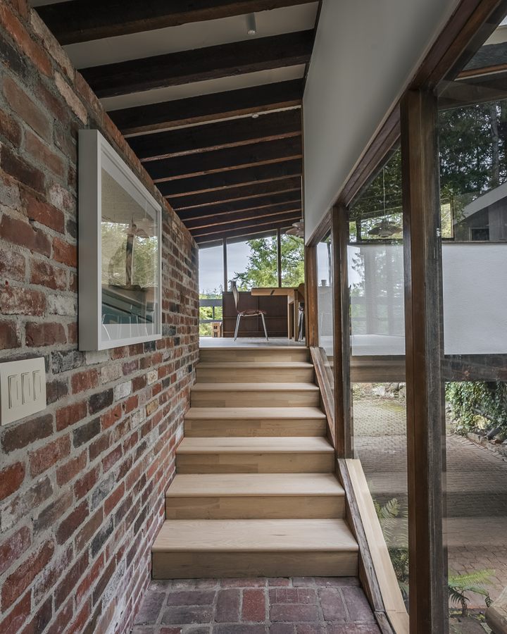 Brick stair hall with timber framing