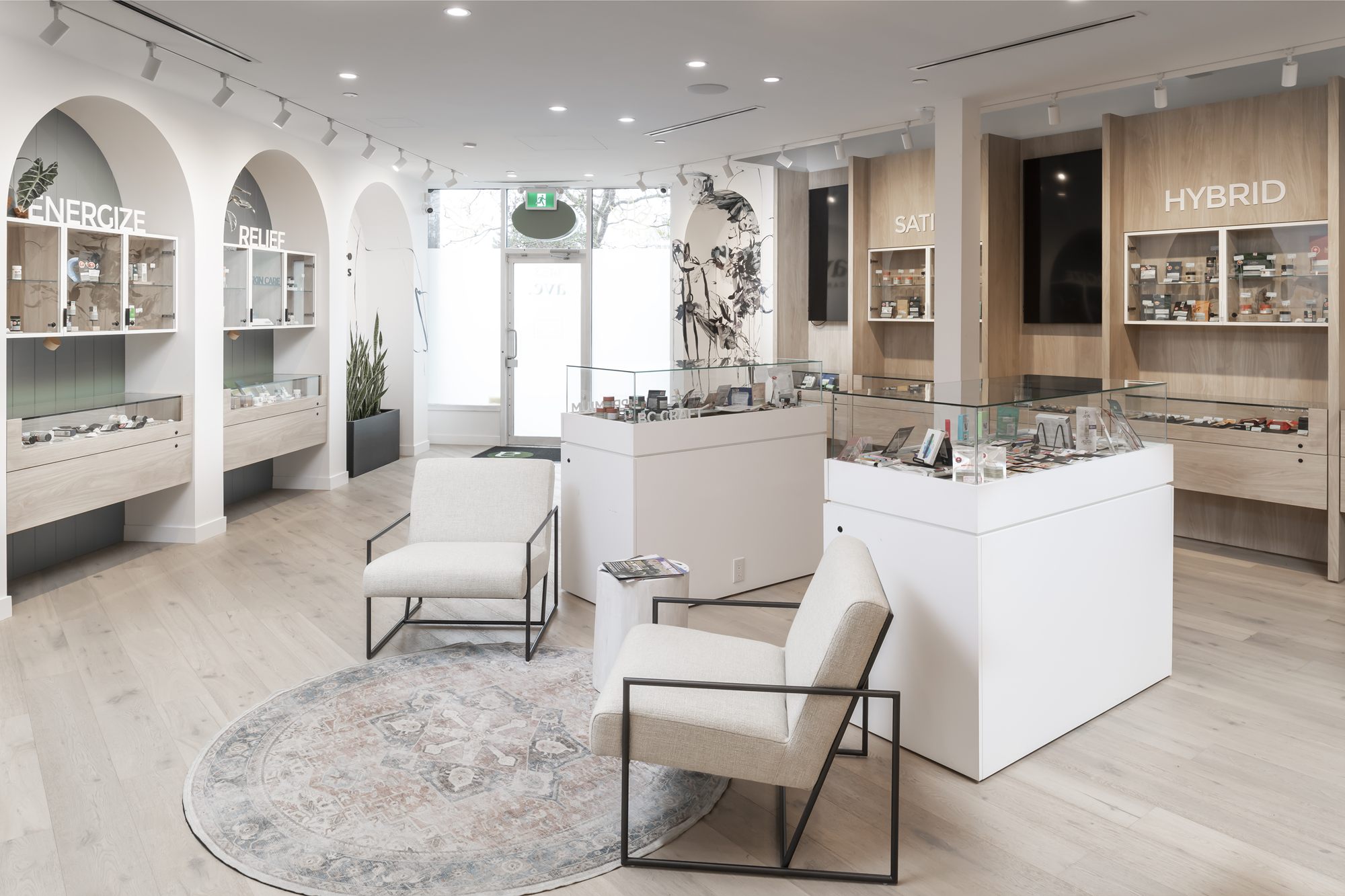 Retail floor with arched display bays and white island counters