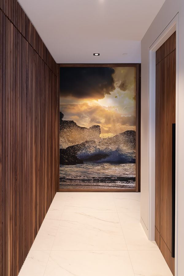 Walnut-panelled hallway leading to framed artwork