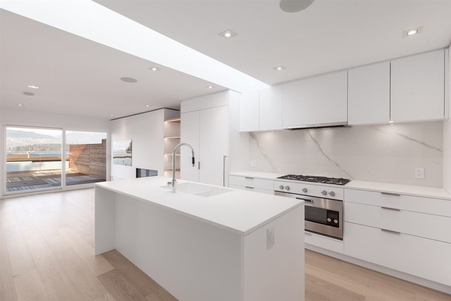 Kitchen island with views out to the deck