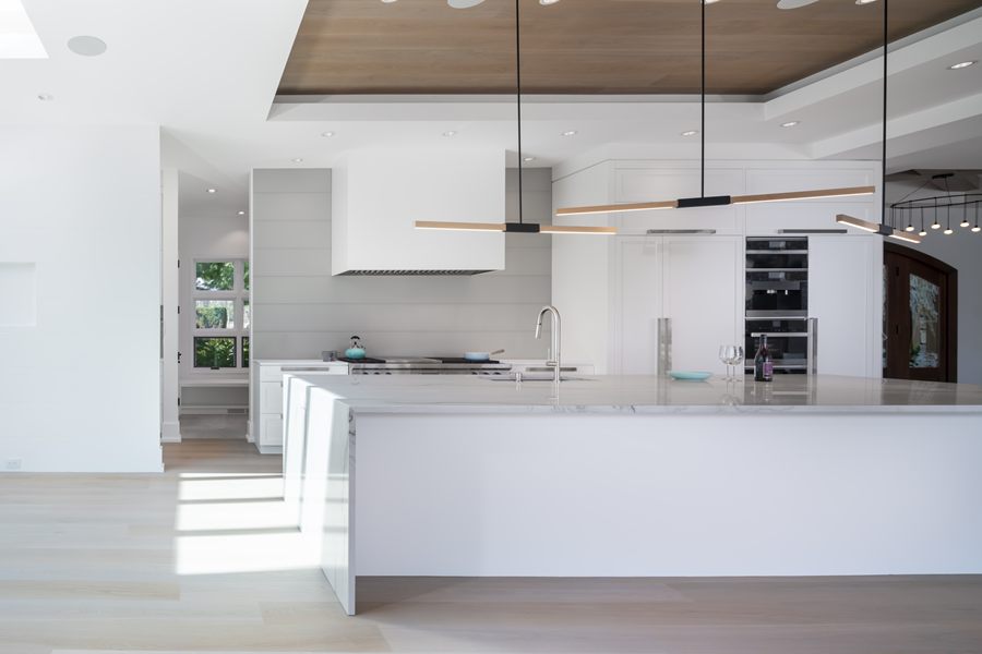 Kitchen island and tall oven wall