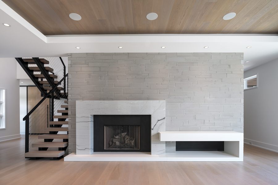 Fireplace wall and open staircase