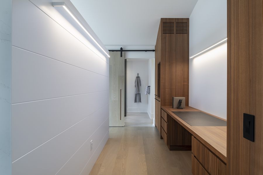 Hidden desk built into the primary bedroom wall