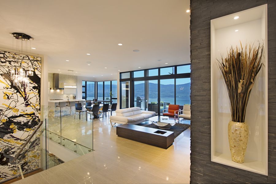 Living room with a stone niche and lake view