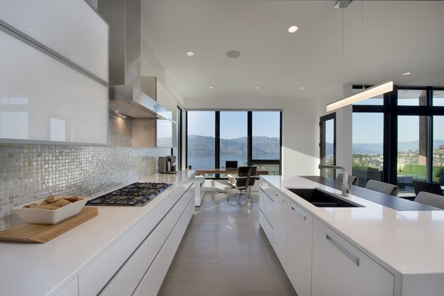 Long galley kitchen leading to the dining room