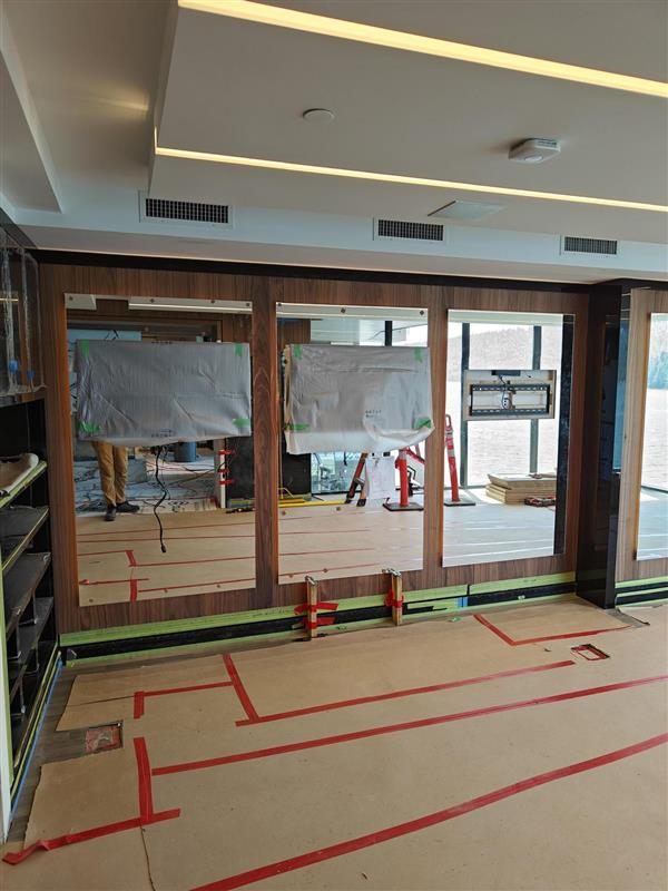 Wall units installed with the floor still protected
